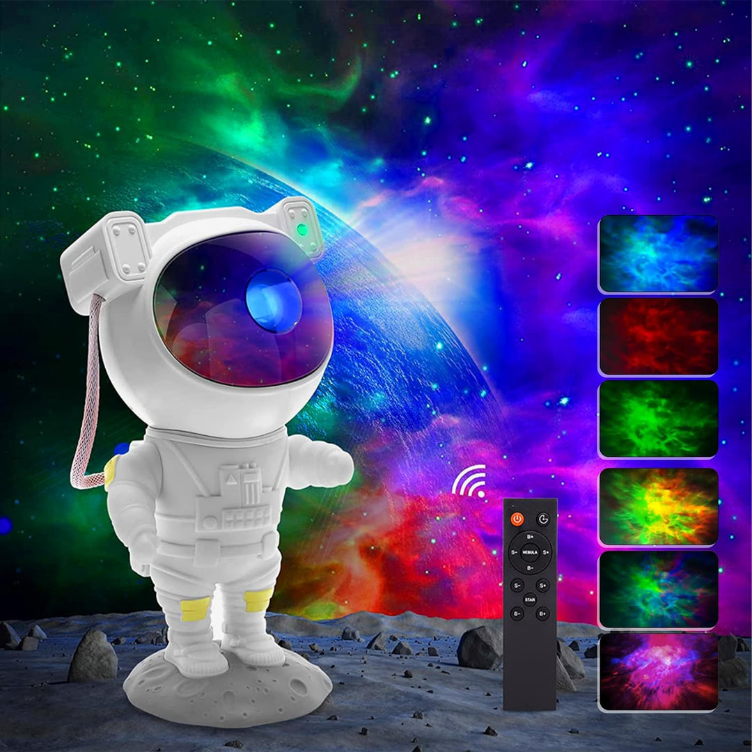 A Astronaut Nebula Galaxy Night Light Projector displaying various colorful nebula effects on a wall, accompanied by a remote control.
