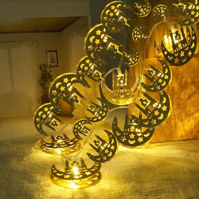 crescent moon LED lantern string lights glowing indoors