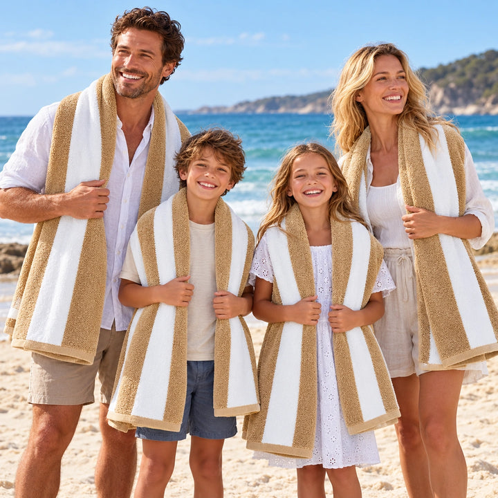 Stack of beige striped towels with white bands for bathroom comfort