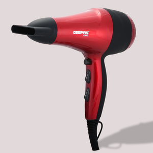 Red ionic hair dryer with concentrator nozzle for fast drying