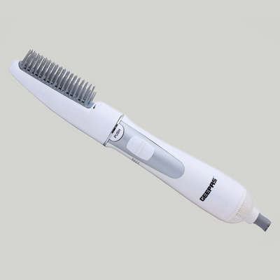 Electric hair straightening brush with heated bristles for smooth styling