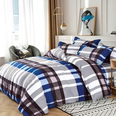 Checkered bedding set with bed sheet, quilt cover, and matching pillow covers, neatly styled on a bed