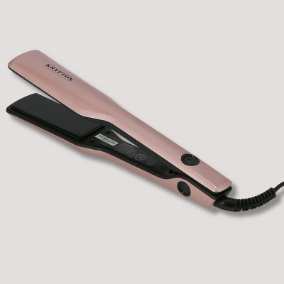 Rose gold hair straightener with ceramic plates and power cord