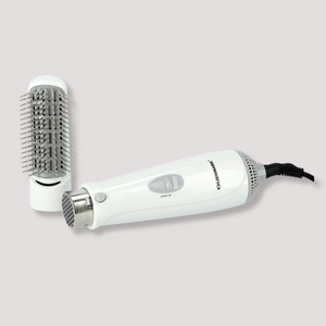 White hot air brush hair dryer with detachable round styling brush, shown ready for everyday hair styling at home