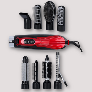 Red and black hot air hair styler set with multiple brush and nozzle attachments, shown laid out for easy styling