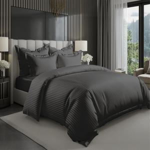 Dark grey hotel style bedding set with satin stripe duvet cover and pillow covers on bed