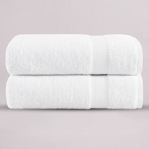 Two spa white bath towels set  stacked 