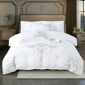 White bedsheet set with elegant silver embroidery and matching pillow covers
