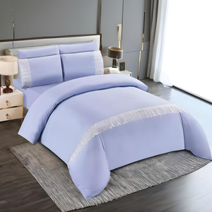 Light blue quilt cover with fitted sheet and matching pillowcases featuring lace trim