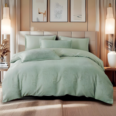 Sage green bedding set with textured quilt cover, fitted sheet, and pillowcases