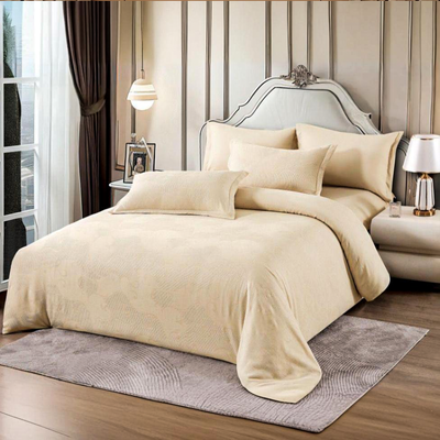 Cream bedding set with fitted sheet, quilt cover, and matching pillow covers, neatly styled on a bed