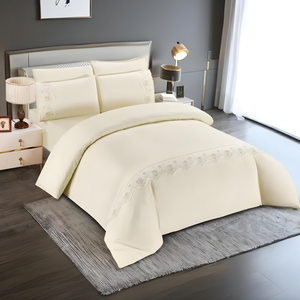 Cream duvet cover set with lace trim styled on a neatly made bed