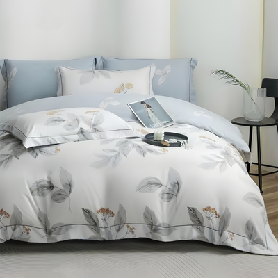 White bedsheet set with grey floral leaf print and matching pillow covers