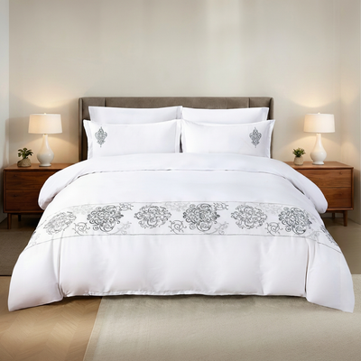 Minimal white bedding set with grey embroidered border design uae