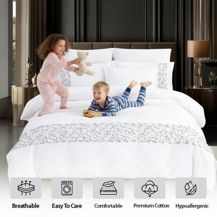 Elegant white bedding with subtle embroidered detailing mooncee uae