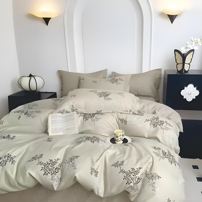 Cream botanical patterned bedding set including bedsheet, duvet cover, fitted sheet, and pillowcases