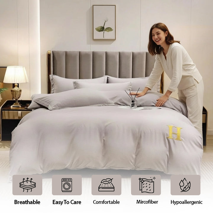 Neutral bedroom showing bed sheet, quilt cover, and pillow cover in soft grey tone