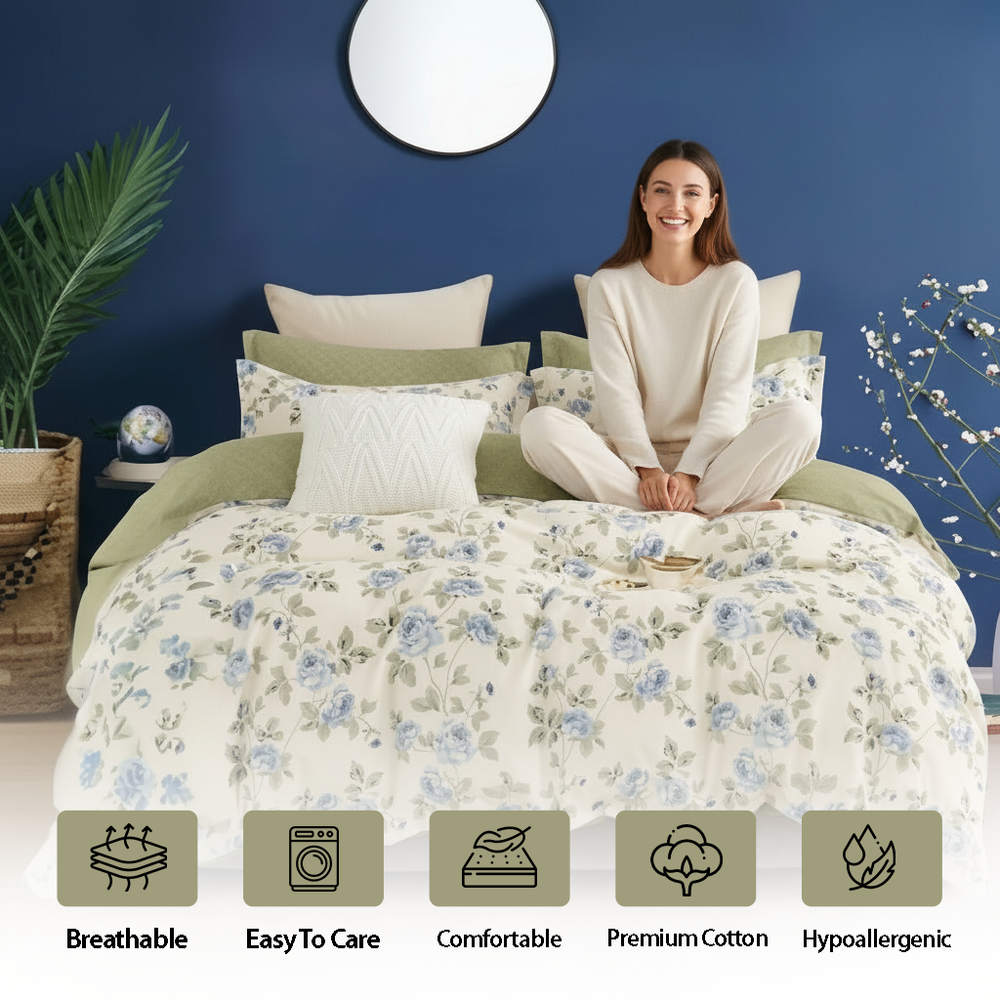 Floral quilt cover layered with olive green sheets and pillows