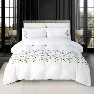 White king size bedding set with elegant floral embroidery
