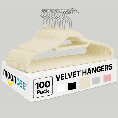 Set of 100 cream velvet hangers designed for slim and space-saving storage