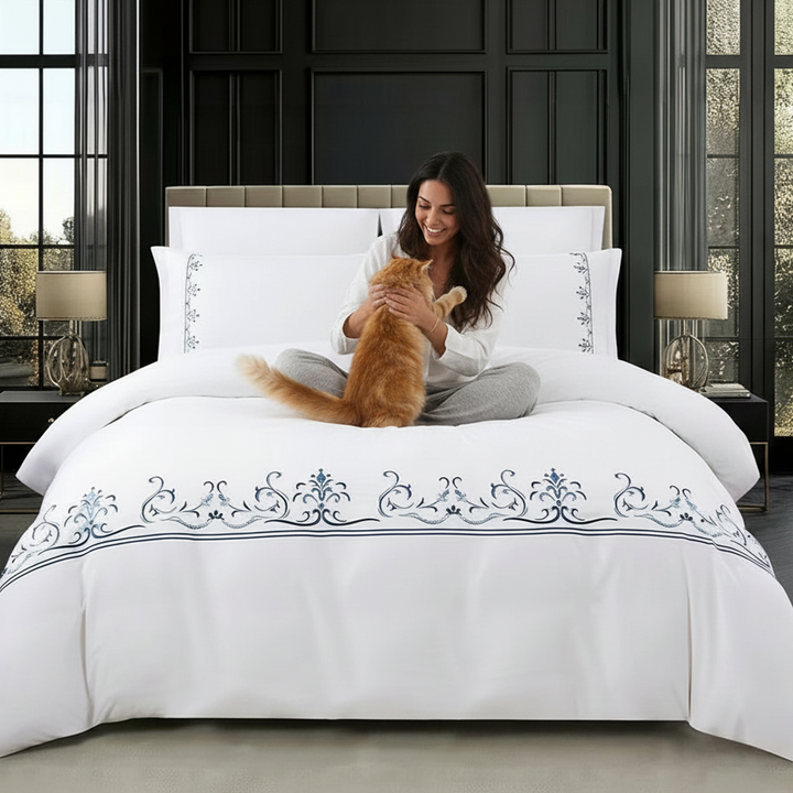 Elegant white duvet with detailed blue embroidery pattern uae