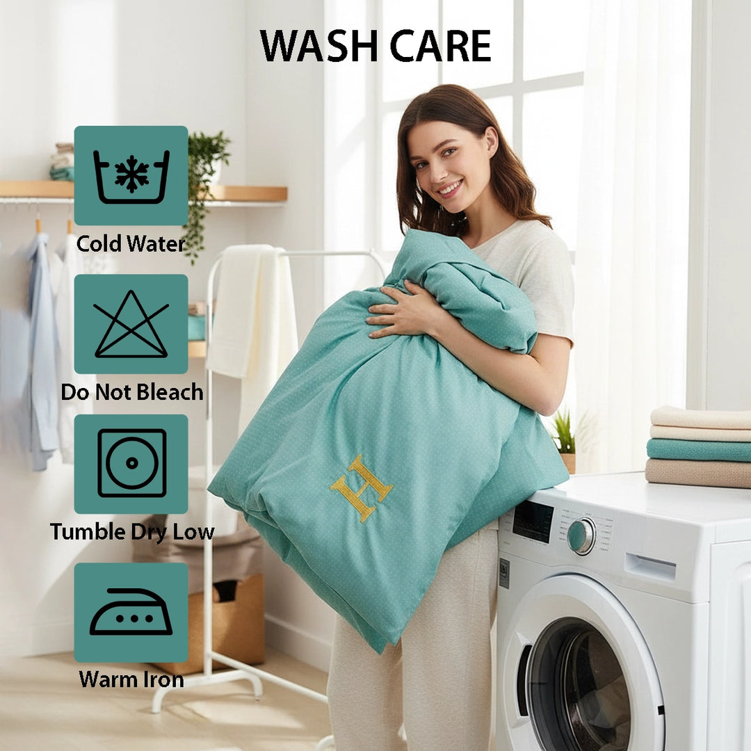 Contemporary bed dressed in teal bed sheet with quilt cover and pillow cover