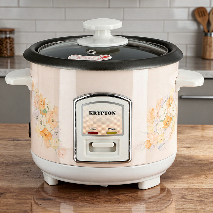 Rice cooker with steaming tray and measuring cup
