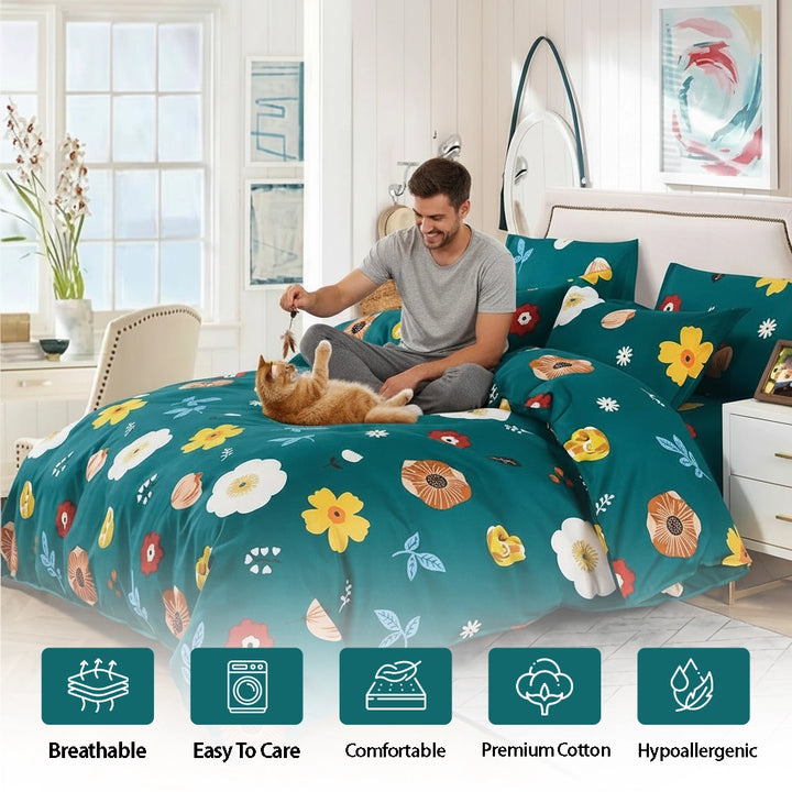 Floral print quilt cover layered over bed sheet with coordinated pillow cover