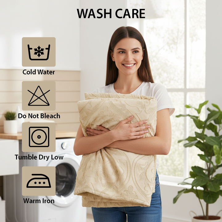 King size beige bedspread with ornate textured pattern