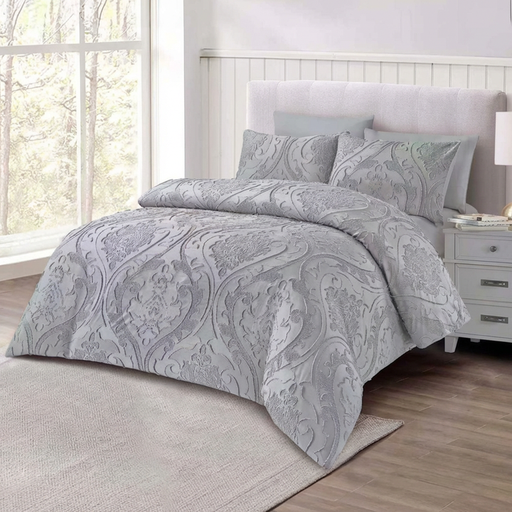 Elegant grey bedding set styled in contemporary room
