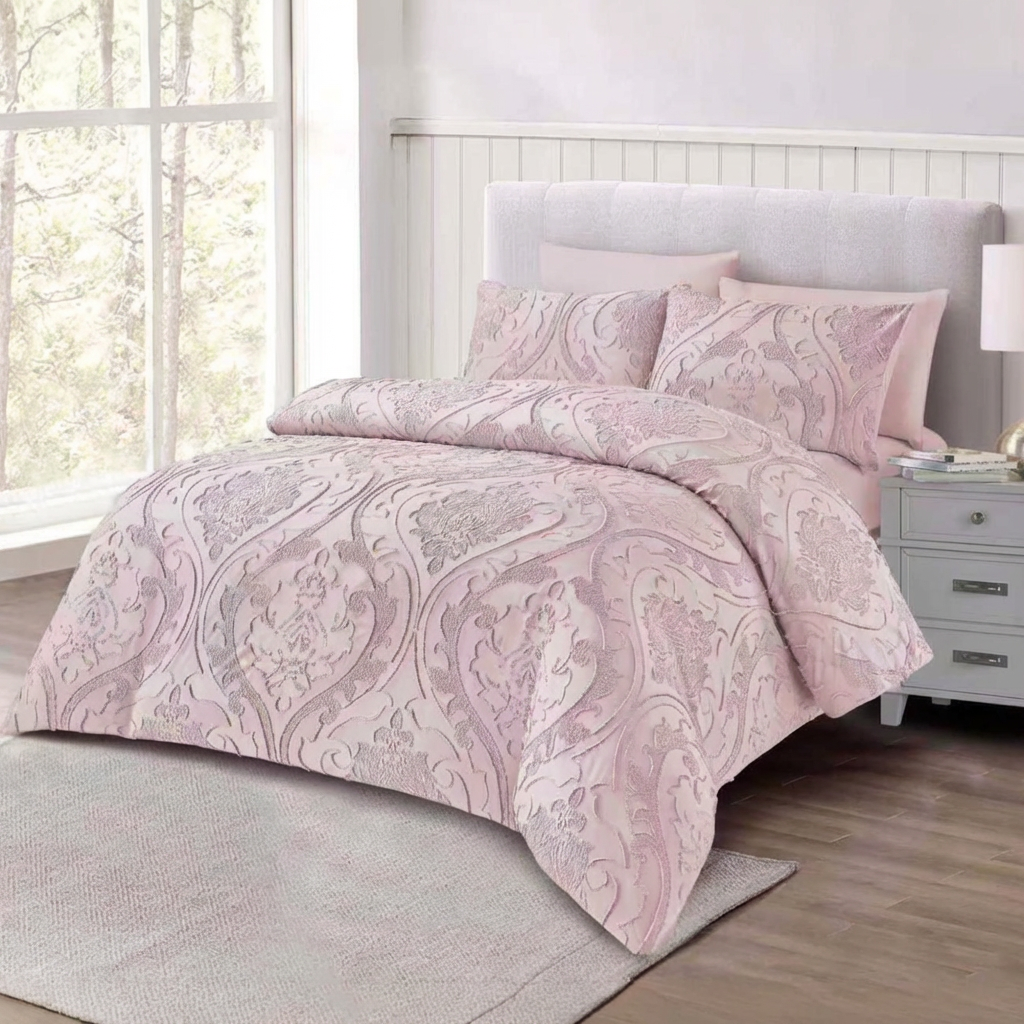 King size pink bedding set with matching pillows