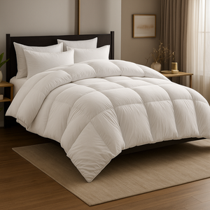 White bedding set with fitted sheet, comforter, pillow cases, and pillow shams, neatly styled on a bed