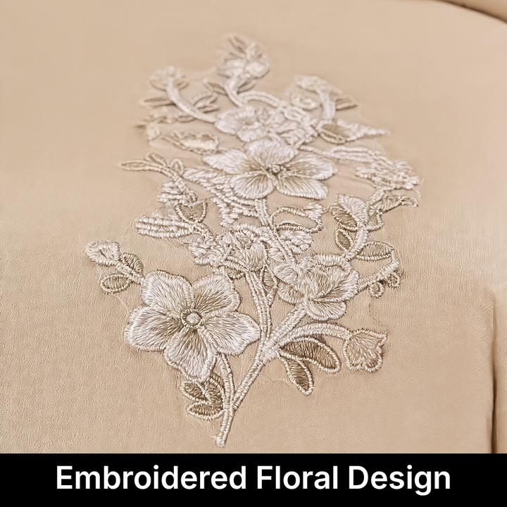 Embroidered floral design on beige in fabric uae