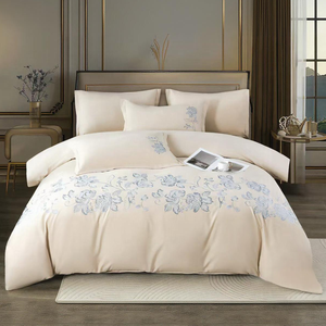 Beige king size bedding set with blue floral embroidery