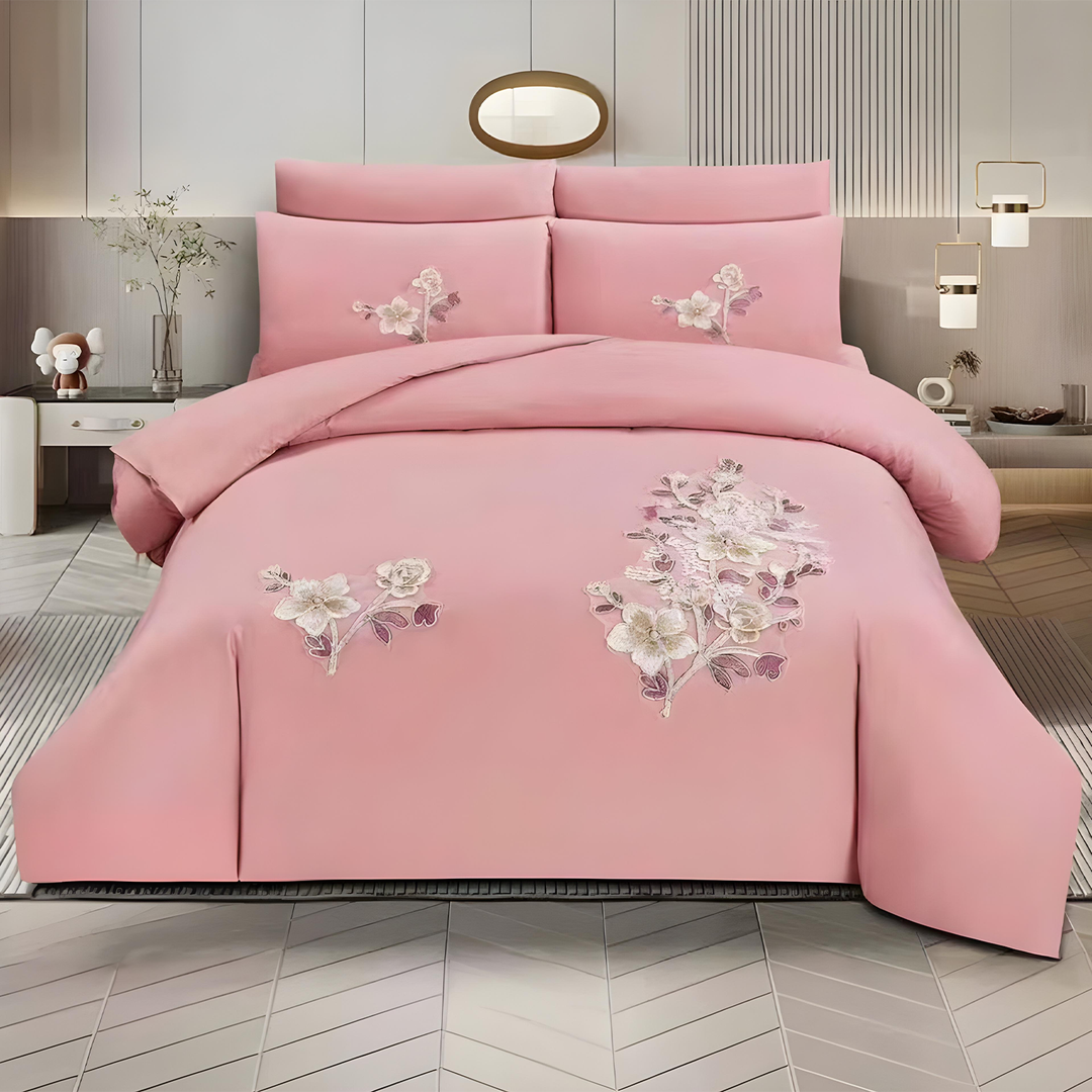 Pink embroidered king size bedding set with floral design