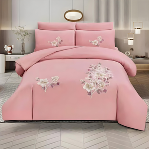 Pink embroidered king size bedding set with floral design