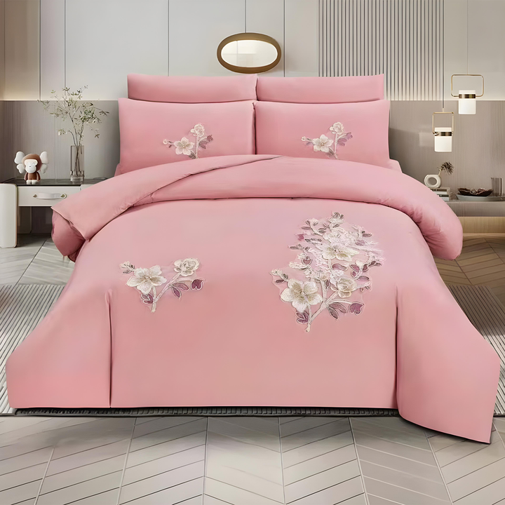 Pink embroidered king size bedding set with floral design