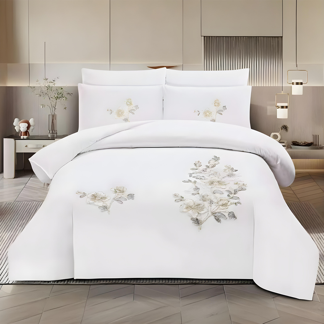 Premium king size bedsheet set in white with detailed embroidery work