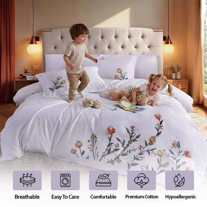 Embroidered flower bedding showing bed sheet, quilt cover, and pillow cover on bed