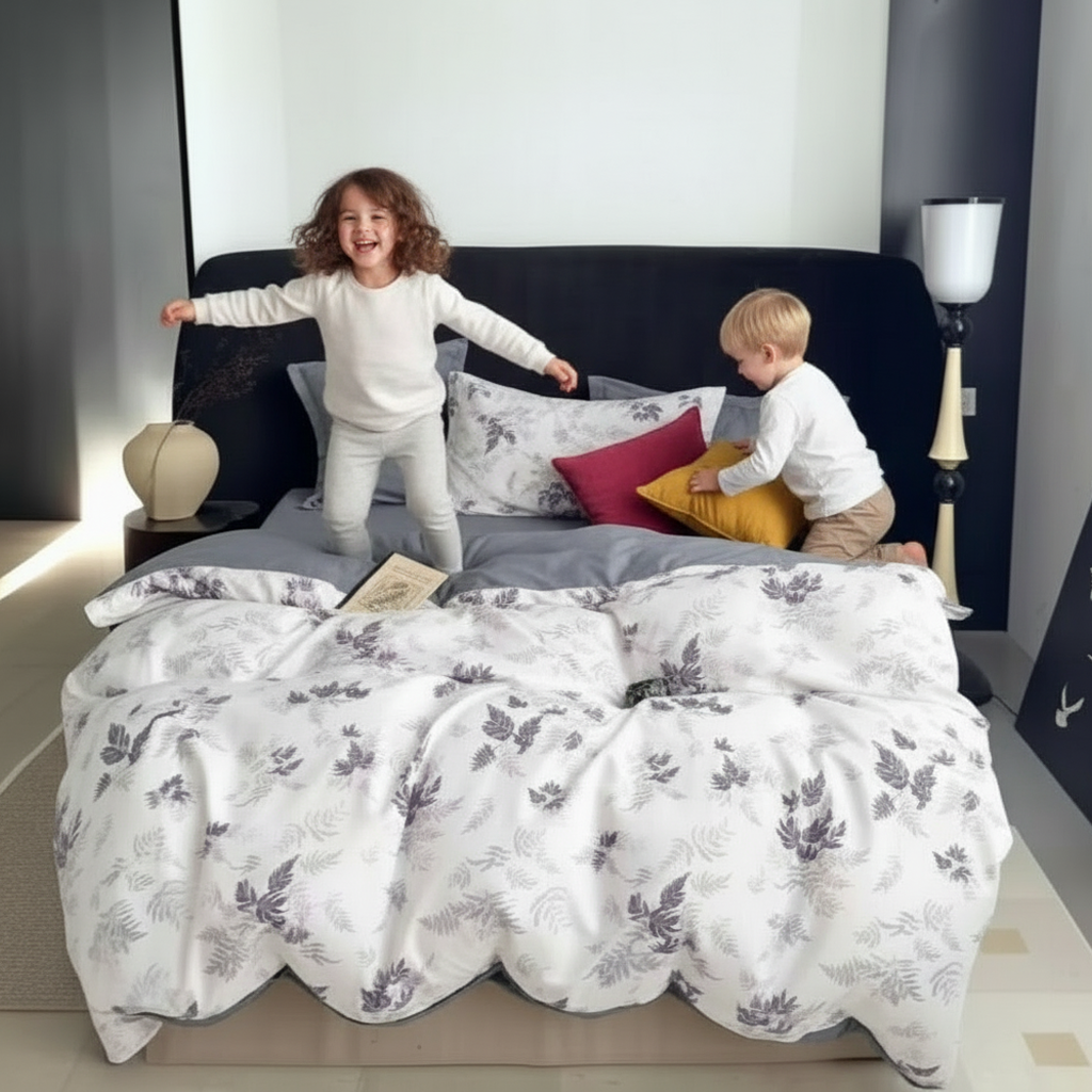 Light toned bed linen decorated with muted foliage designs