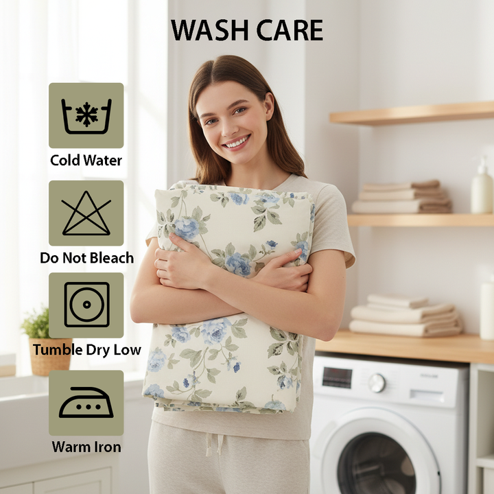 White duvet showcasing delicate blue blossoms and leafy stems