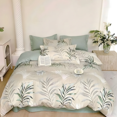 Leaf print bedding set with quilt cover, bed sheet, and pillow covers on bed