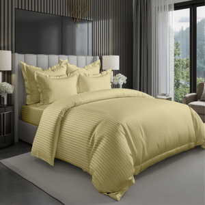 Light olive hotel style bedding set with satin stripe duvet cover and pillow covers on bed