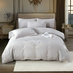 Light grey bedsheet set with elegant embroidered motif and matching pillow covers