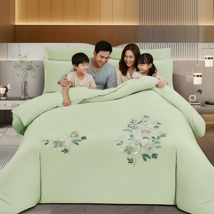 Elegant green bedsheet set with matching pillowcases and floral design in uae