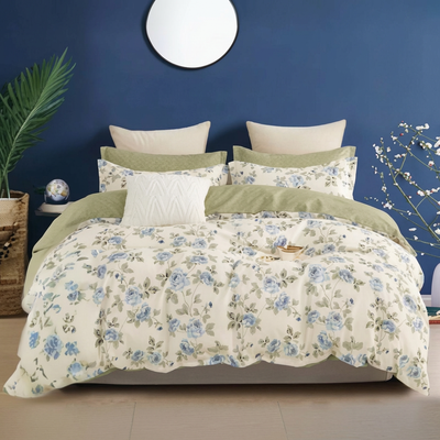 Cream bed linen decorated with soft blue rose patterns