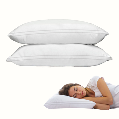 White pillow inserts stacked neatly, showing smooth fabric and clean finish