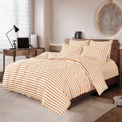 Striped bedding set with flat sheet, quilt cover, and matching pillow covers, neatly styled on a bed