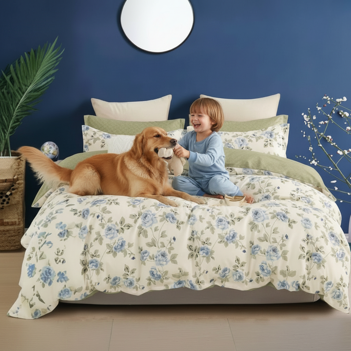 Cozy bed styled with pastel floral prints and neutral cushions