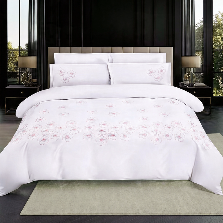 White embroidered king size bedding set with floral design